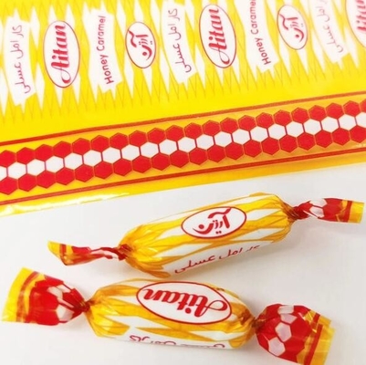 فلیم رنگین کمان عمده فروشی PVC طبیعی Candy Twist Sequin Film برای بسته بندی و تزئین