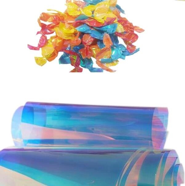 فلیم رنگین کمان عمده فروشی PVC طبیعی Candy Twist Sequin Film برای بسته بندی و تزئین